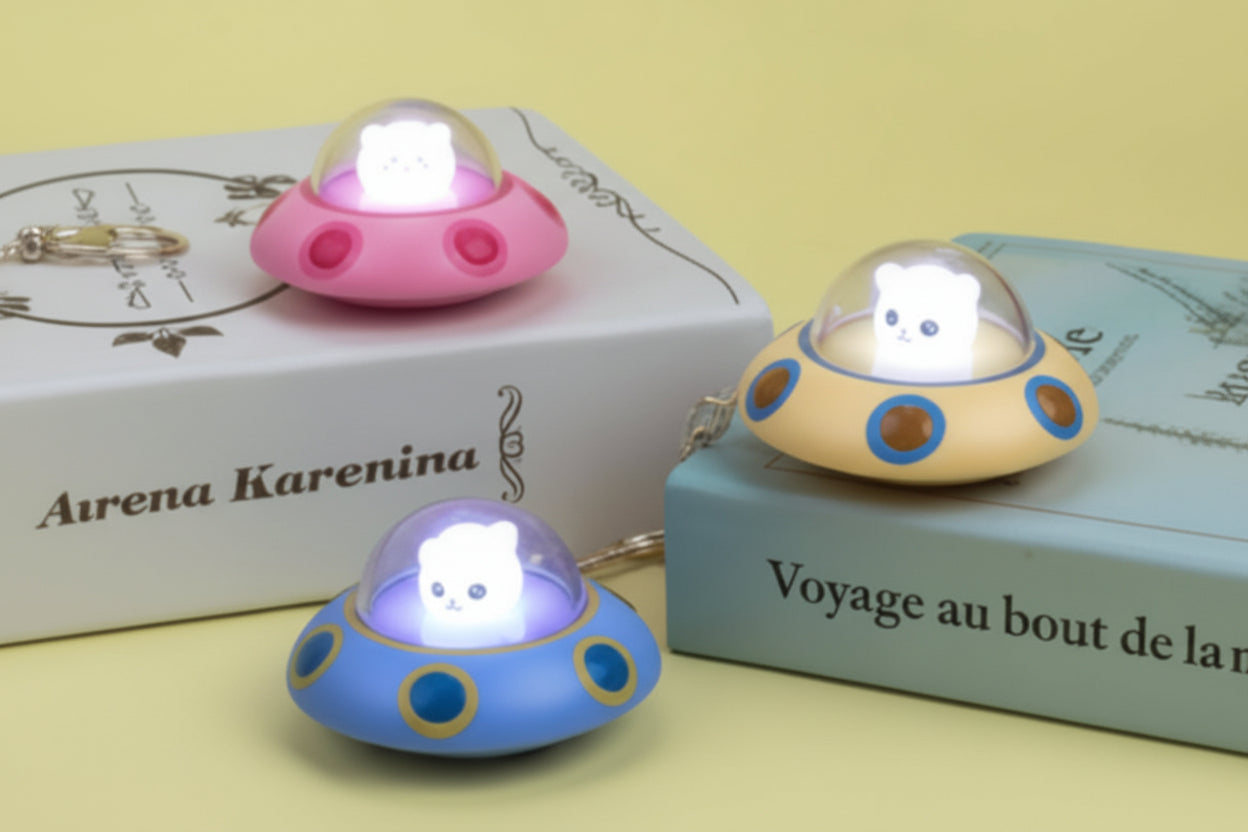 UFO Glow Mini Spaceship Starlight Keychain – Limited Edition LED Space Pendant Accessory