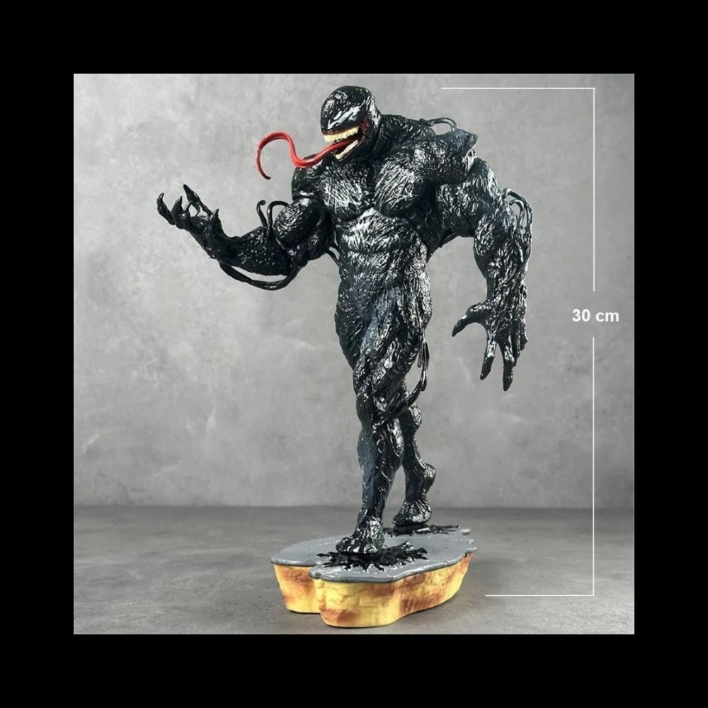 Venom figurine on a gray background with measurement scale